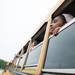 A Willow Run Student looks out at the school from her bus on the schools last day open, Friday June 7.
Courtney Sacco I AnnArbor.com   